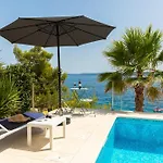 Beachfront Leonardo With Pool Villa